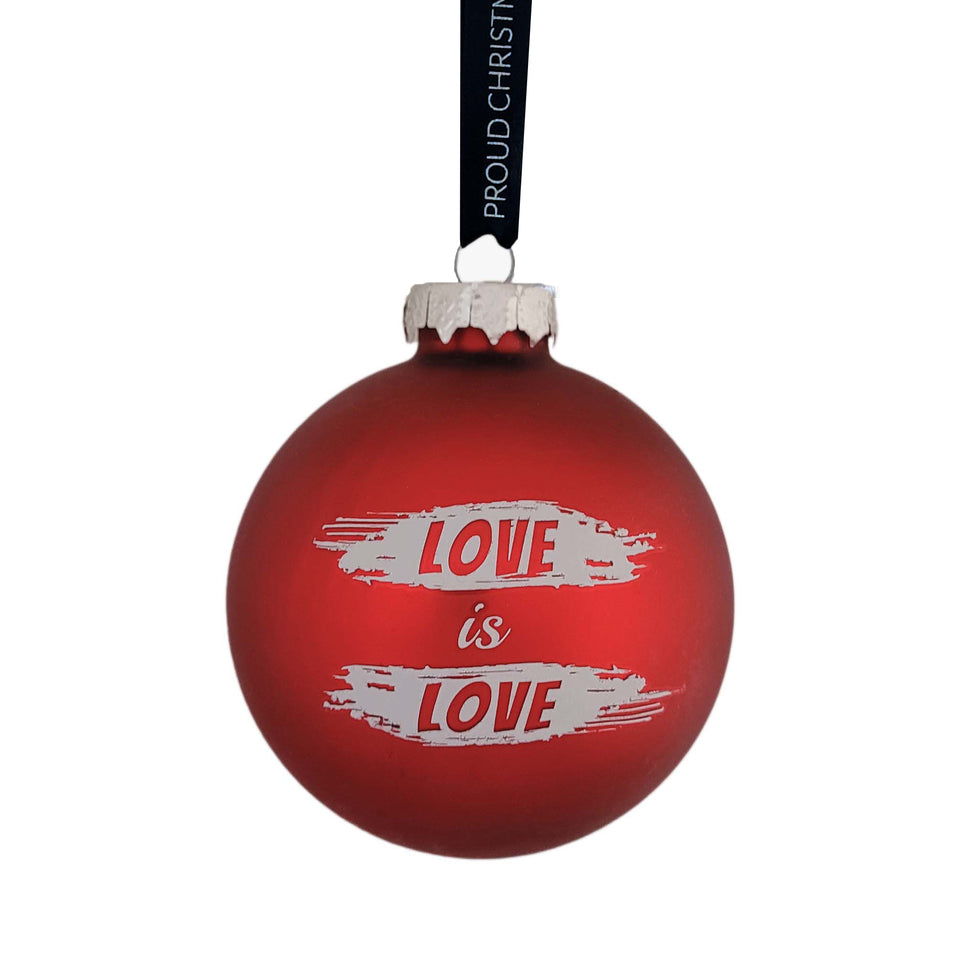 Decorate your Christmas tree with the red Love is Love bauble from Proud Christmas. The bauble is made in glass and comes in a giftbox.